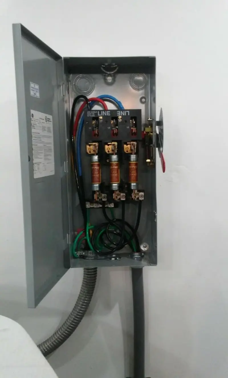 Three-phase disconnect switch installed for Smoke Detector Installation in Camp Swift
